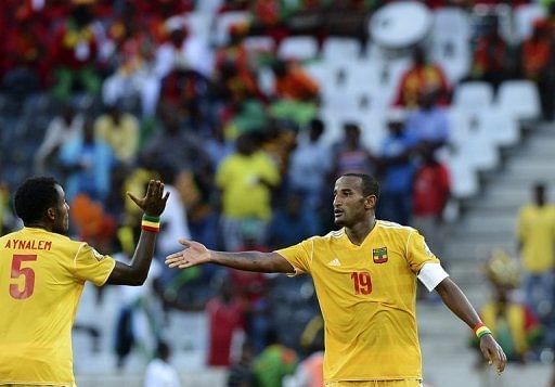 Ethiopia's Girma Gebrayes (R) celebrates after scoring a goal against Zambia in Nelspruit on January 21, 2013